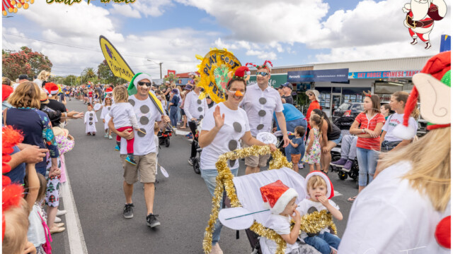 Image © Claude Thérond – used with permission Query successful The Pohutukawa Coast Santa Parade with people in festive attire