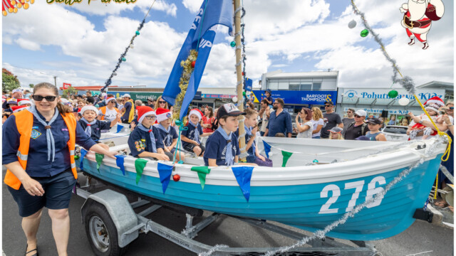 Image © Claude Thérond – used with permission Sea Scouts in decorated boat float at Pohutukawa Coast Santa Parade