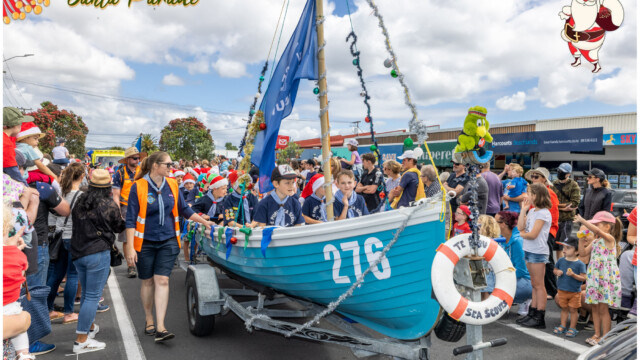 Image © Claude Thérond – used with permission Sea Scouts with decorated boat float at Pohutukawa Coast Santa Parade